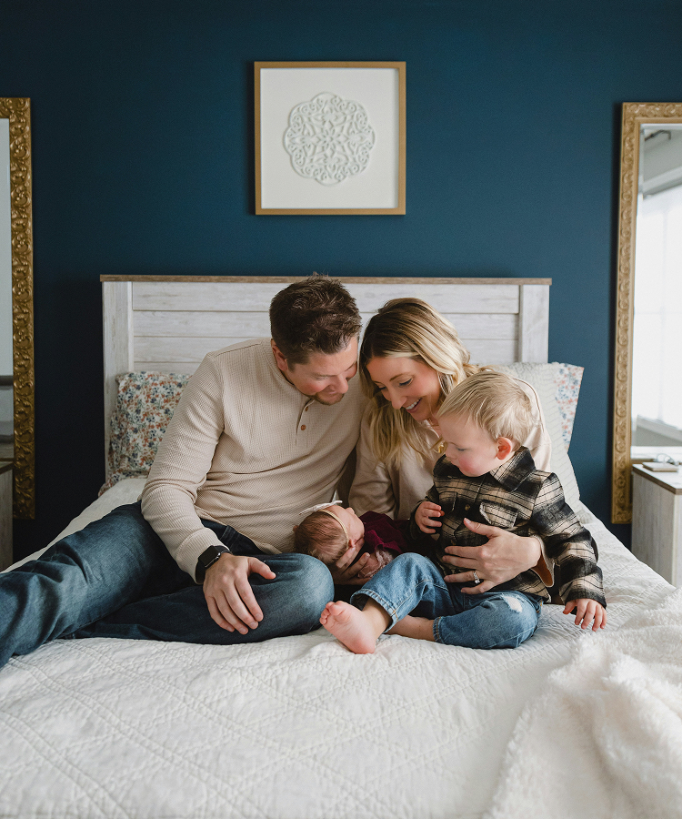 Smiling Family with Newborn